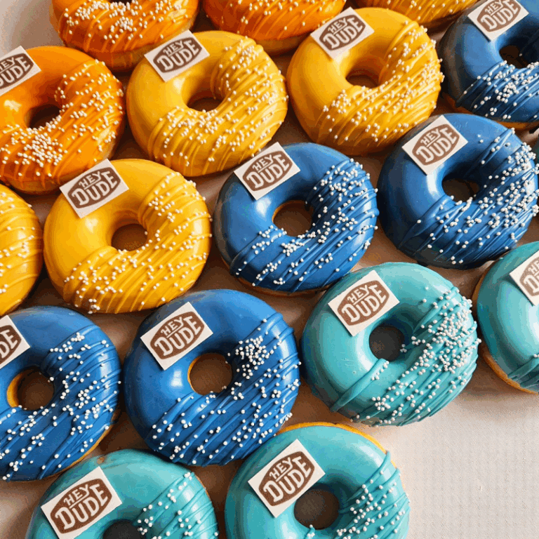 donut met logo in goodiebag als creatieve merkuiting